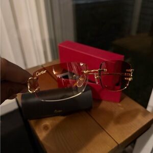 Cartier Women’s Rimless Sunglasses with Red Gradient Lenses and Gold Hardware